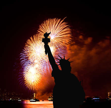 The silhouette of Statue of Liberty Statue of Liberty and July 4th fireworks over Hudson Riverの写真素材