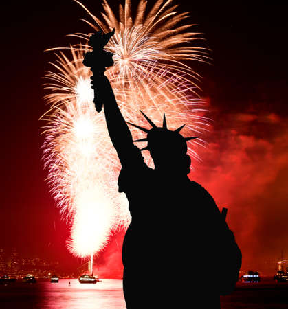 The silhouette of Statue of Liberty Statue of Liberty and July 4th fireworks over Hudson Riverの写真素材