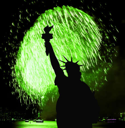 The silhouette of Statue of Liberty Statue of Liberty and July 4th fireworks over Hudson Riverの写真素材