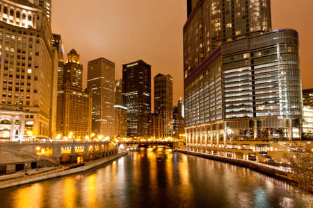 The high-rise buildings along Chicago River at Nightの写真素材