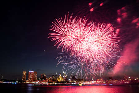 The July 4th firework over Delaware River with Philadelphia skylinesの写真素材
