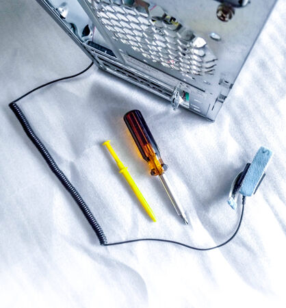 pc tower with repair toolsの写真素材