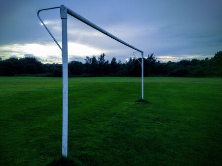 football goalposts at duskの写真素材