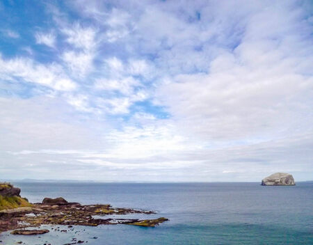 view onto bass rock near north berwickの写真素材