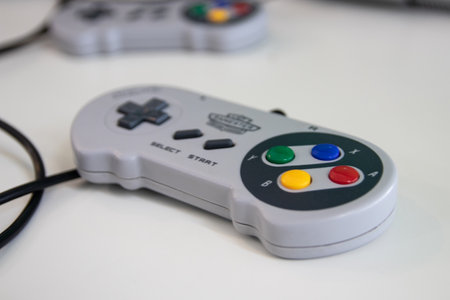 A super Nintendo games console controller which was part of the games console known as a SNES...