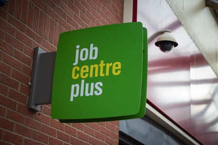 09/14/2019 Portsmouth, Hampshire, UK a jobcentre plus sign and a security cameraのeditorial素材