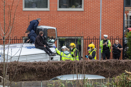 09/14/2019 Portsmouth, Hampshire, UK a fire and rescue crew attending to an overturned lorry traffic accidentのeditorial素材