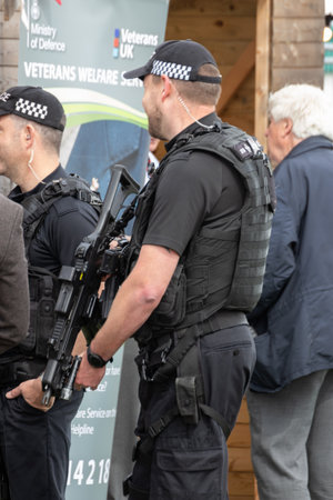 09/14/2019 Portsmouth, Hampshire, UK Armed British police officers policing an outdoor eventのeditorial素材