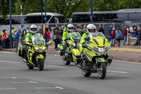 09/14/2019 Portsmouth, Hampshire, UK police outriders on motorbikes or motorcycles escorting a motorcadeのeditorial素材