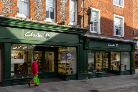 11/06/2019 Winchester, Hampshire, UK The exterior of a Clarks shoe shop or shoe store on a high streetのeditorial素材