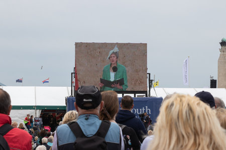 09/14/2019 Portsmouth, Hampshire, UK crowds looking up at a screen while theresa May gives a speechのeditorial素材