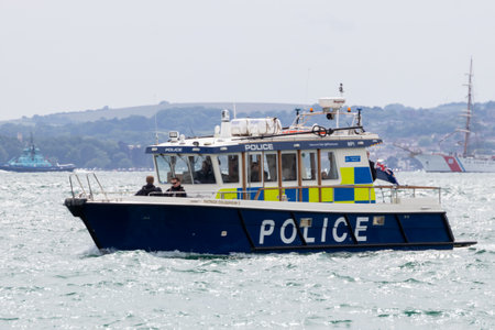 09/14/2019 Portsmouth, Hampshire, UK a police boat patrolling waters around the coastのeditorial素材