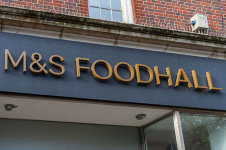11/06/2019 Winchester, Hampshire, UK the sign of a M&S Foodhall or marks and spencer foodhall shop store or shopのeditorial素材