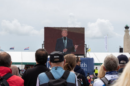09/14/2019 Portsmouth, Hampshire, UK crowds watching a big screen while president trump speekes to a rallyのeditorial素材