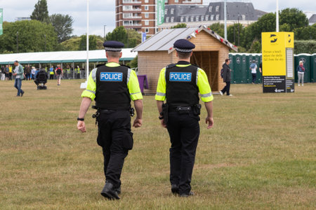 09/14/2019 Portsmouth, Hampshire, UK british police officers on duty in uniformのeditorial素材