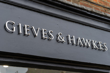 11/06/2019 Winchester, Hampshire, UK the sign above Gieves and Hawkes tailorsのeditorial素材