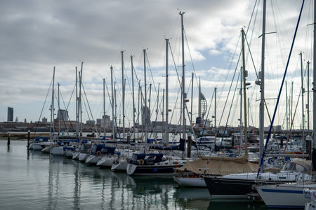 01/29/2020 Gosport, Hampshire, UK sailing boats docked in Gosport Marina, Hampshire With spinnaker tower in the backgroundのeditorial素材