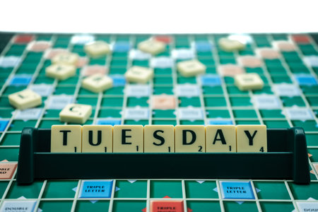 Photo pour 02/09/2020 Portsmouth, Hampshire, UK the word Tuesday spelled out on scrabble tiles on a scrabble board - image libre de droit