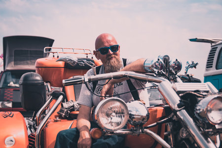 05/04//2020 Portsmouth, hampshire, UK A middle aged biker on his motorcycleのeditorial素材