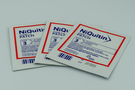 04/23/2020 Portsmouth, Hampshire, UK Niquitin Nicotine patches isolated on a white backgroundのeditorial素材