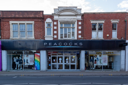 08/02/2020 Portsmouth, Hampshire, UK The exterior of a closed Peacocks clothes store, an english high street shopのeditorial素材