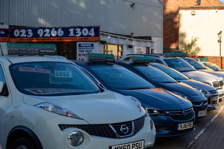 08/02/2020 Portsmouth, Hampshire, UK cars with prices in the windows on display outside a car showroom or car sales centreのeditorial素材