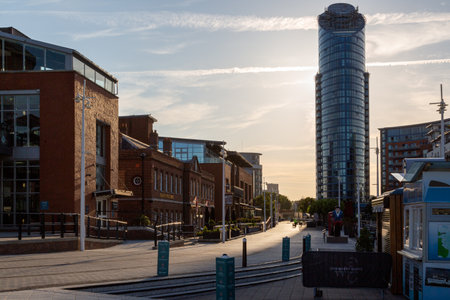 07/22/2020 Portsmouth, Hampshire, UK the main street of gunwharf Quays in Portsmouth looking towards East side plaza or the lipstick tower at sunriseのeditorial素材