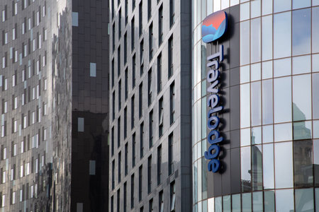 09/29/2020 Portsmouth, Hampshire, UK The exterior of a new Travelodge Hotel showing the logo and adjacent modern buildings in Portsmouth, UKのeditorial素材