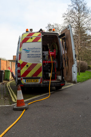 01-08-2020 Portsmouth, Hampshire, UK A southern water maintenance van with the door open running a...