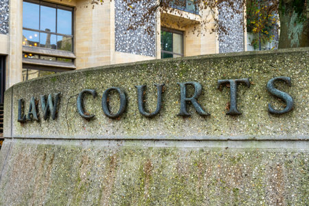a sign reading Law Courts in the exterior of a buildingの写真素材