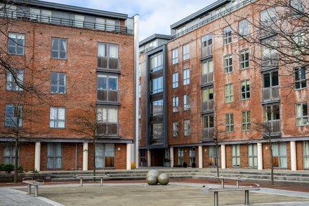 A modern apartment block and forecourtの写真素材