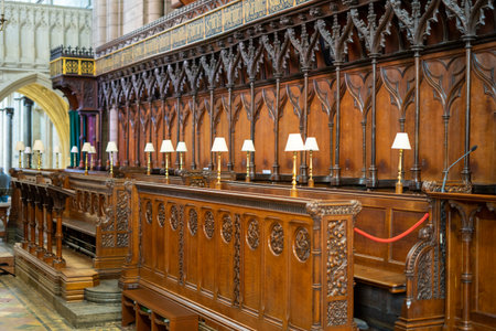 the wooden choir stalls or quire in a cathedralの写真素材