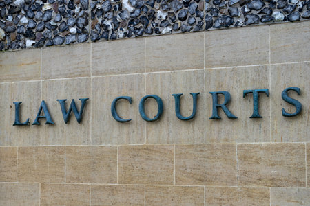 a sign reading Law Courts in the exterior of a buildingのeditorial素材