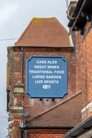 The old sign on the side of an english pubの写真素材