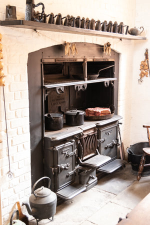 A vintage stove or cooker in an old homeの写真素材