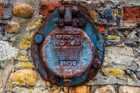 a colourful water inlet at a quaysideの写真素材