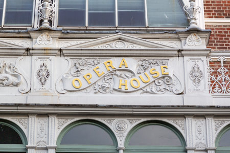 the sign for an opera house on the side of a buildingの写真素材