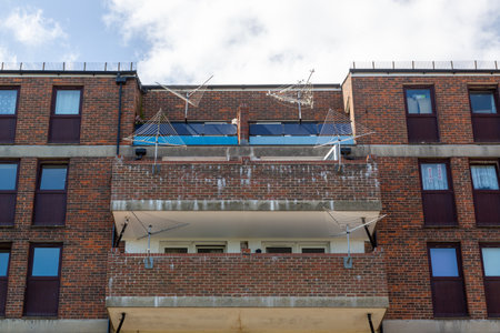 council flat balconies with empty washing linesの写真素材