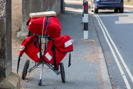 09/15/2020 Ryde, Isle of Wight, UK A Royal mail Postman's Bag trolley on the side of a road, used for carrying mailの写真素材