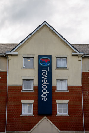 The sign on the exterior of a Travelodge hotelのeditorial素材