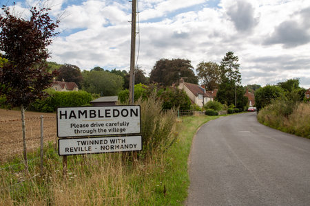 The name sign when entering the Village of Hambledon in Hampshireの写真素材
