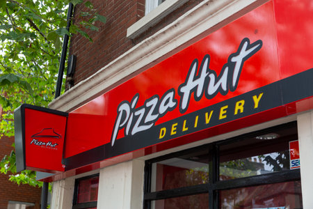12/15/2020 Portsmouth, Hampshire, UK the exterior sign of a Pizza hut delivery restaurantのeditorial素材