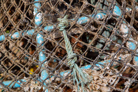 A close up of the ropes of a lobster pot used for fishingの写真素材