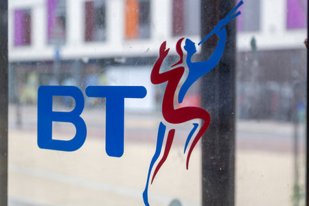 An old BT telephone logo logo on the side of a phone boxのeditorial素材