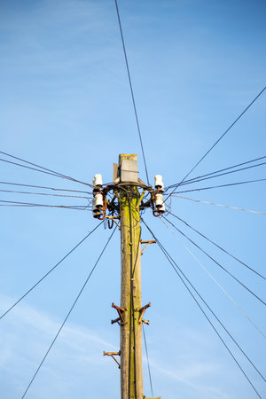 A telephone line pylon in an English streetの写真素材