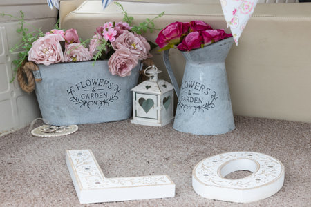 Flowers in vintage flower potsの写真素材