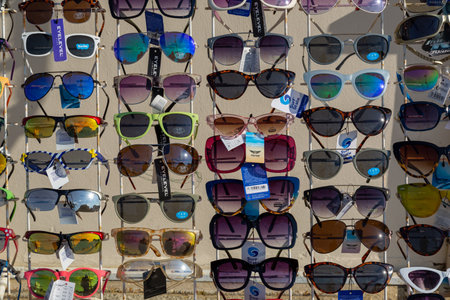 09/15/2020 Ryde, Isle of Wight, UK A rack full of various sunglasses for sale outside a seaside shop
