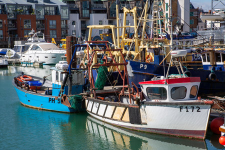 09/08/2020 Portsmouth, Hampshire, UK Fishing boats tied alongside a dock, Camber Dock, Portsmouth UKのeditorial素材