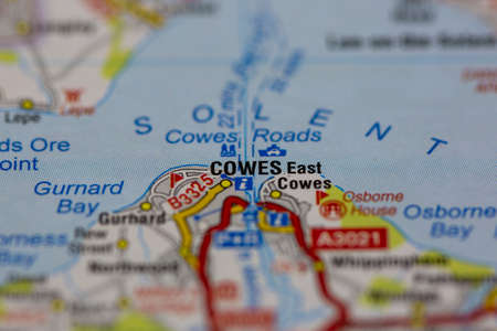 02-17-2021 Portsmouth, hampshire, UK Cowes on the isle of wight shown on a map using selective focusのeditorial素材