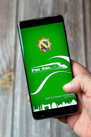 03-10-2021 Portsmouth, Hampshire, UK A Mobile phone or cell phone being held in a hand with the Pak...